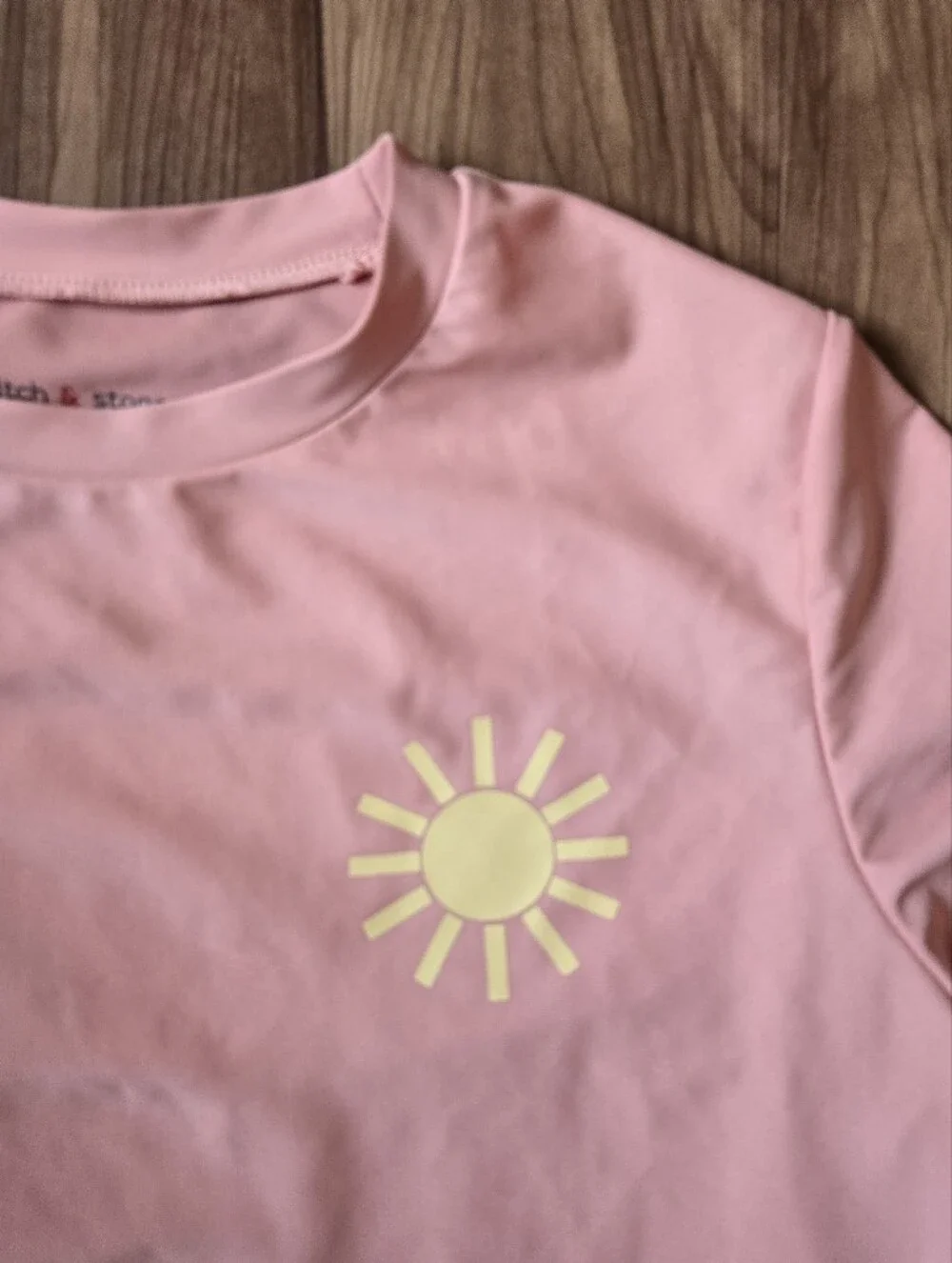 Kids size 10 VGUC set of two Short Sleeve Rashguards Cream & Pink